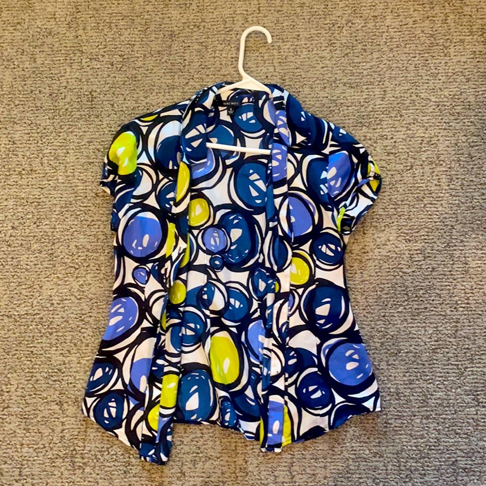Colorful silky polo shirt.